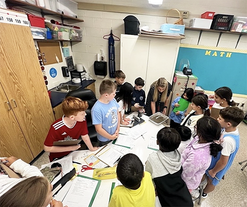 Fourth graders at Memorial Elementary learning about earthquake movement