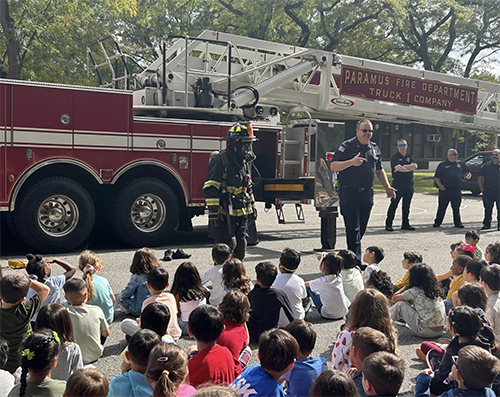 Firefighters from the Paramus Fire Department visiting Memorial Elementary School students