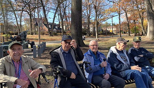 Group of Veteran heroes sitting outside