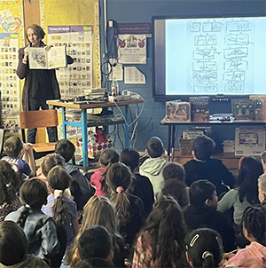 Author Meghan McCarthy reading to students