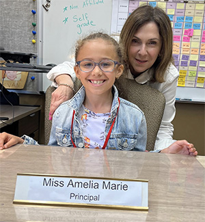 Amelia Marie with the principal