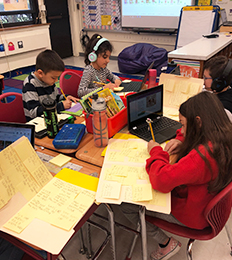 Students engaged in learning in the classroom